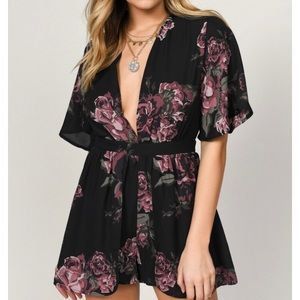 Tobi Black Floral Romper. Tags on and never worn!